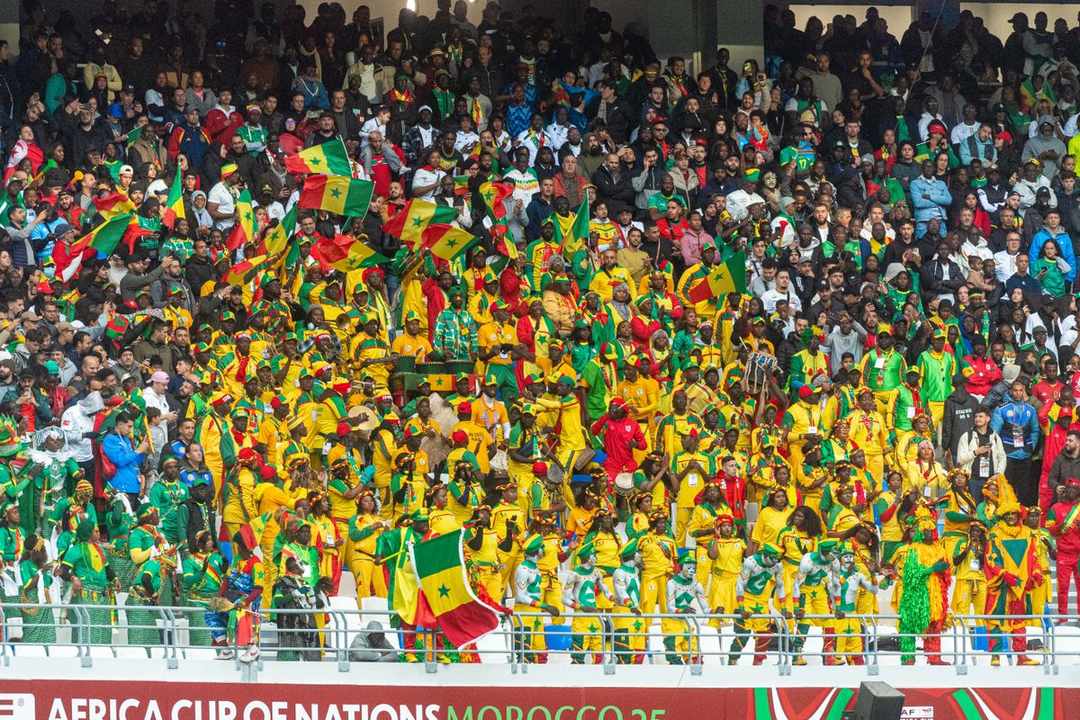Taxe sur les gains de paris au Togo : tribune de supporters de football